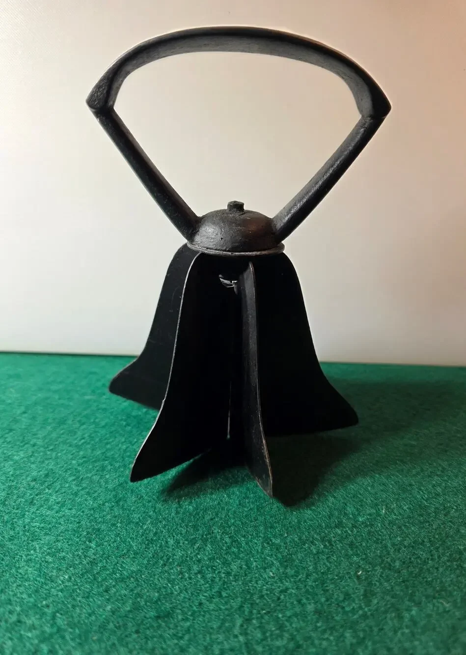 Vintage handheld metal food chopper bell-shaped cast iron handle